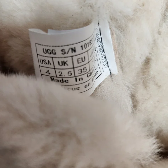 Cozy Ugg Shearling Boots with Pink Pom Poms - Picture 7 of 8